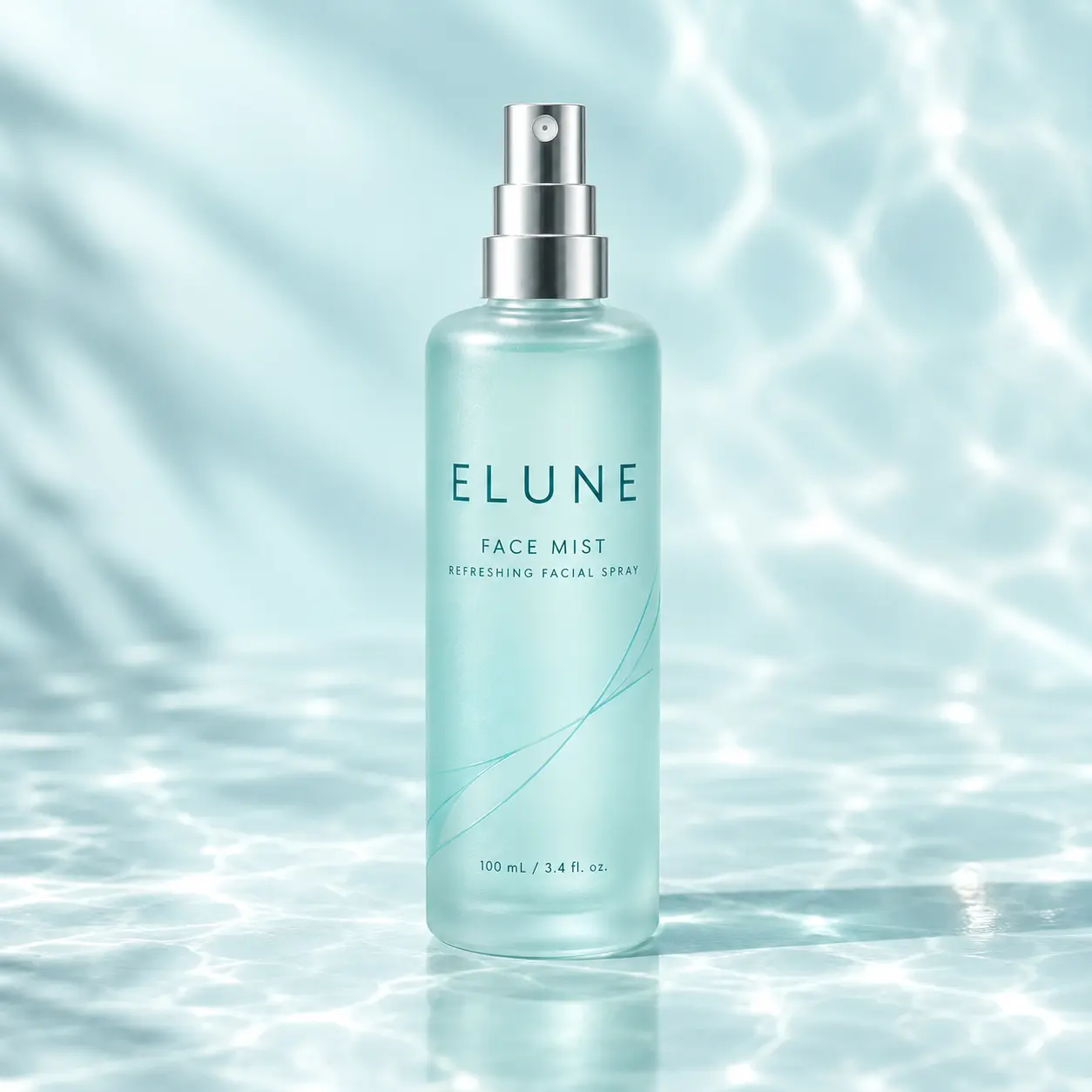 ELUNE face mist in a frosted aqua bottle with a fully silver spray head